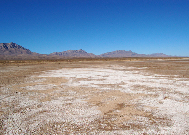 Patches of halite on the bottom of a dry Lake Lucero