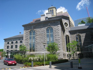 The outside of the Charles Street Jail, a large grey stone complex