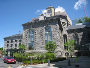 The outside of the Charles Street Jail, a large grey stone complex The outside of the Charles Street Jail, a large grey stone complex