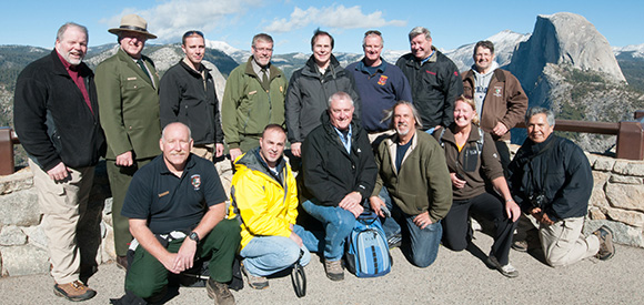 group photo with a scenic mountain view