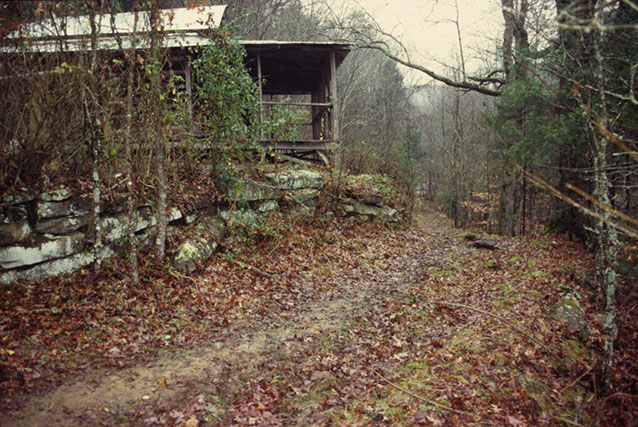 Stone retaining wall along trail (P.C.C. Farmstead: CLI, NPS, 1998)