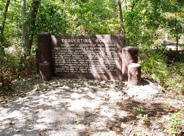 Travertine rock sign (K. Ruhnke, NPS)