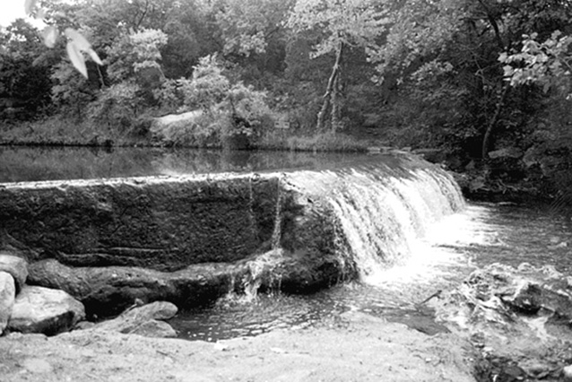 Water cascades over a low concrete dam at Panther Falls, circa 1999 Water cascades over a low concrete dam at Panther Falls, circa 1999