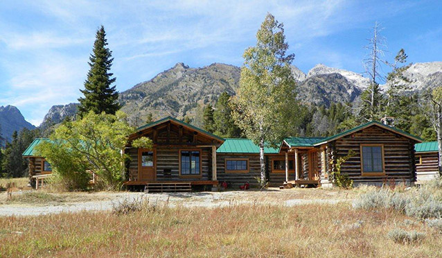 Rehabilitated Hammond Cabin, a log cabin at the base of the Grand Teton mountains.