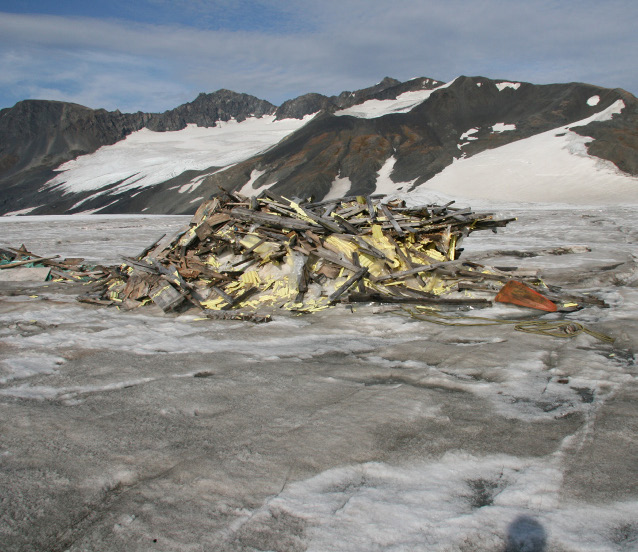 Remains of warming hut melting out of the Harding Icefield in September 2009