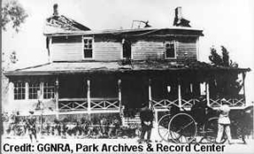 historic photo of an exterior building with fire damage