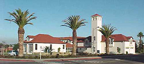 Exterior view of Presidio Fire Station with palm trees