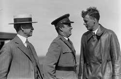 Orville Wright, Major John F. Curry, and Colonel Charles Lindbergh