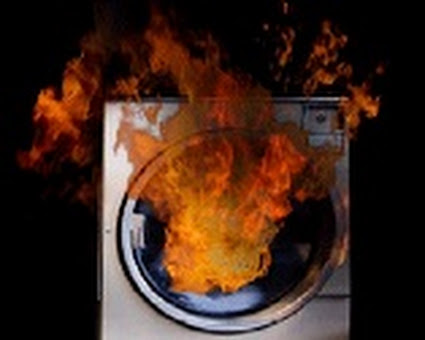 Dryer with fire coming out of it Dryer with fire coming out of it