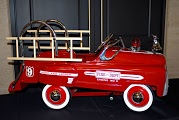 Red antique toy fire engine. Red antique toy fire engine.