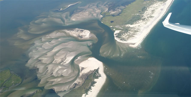 An aerial photograph of the barrier island and wilderness breach.