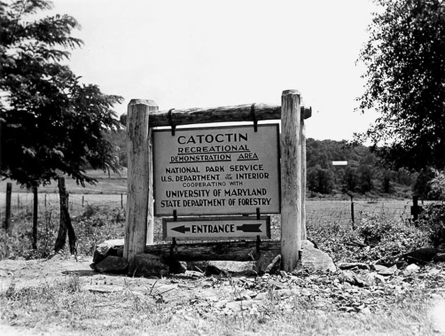 1940s wooden sign on large posts announces the entrance to Catoctin Recreational Demonstration Area