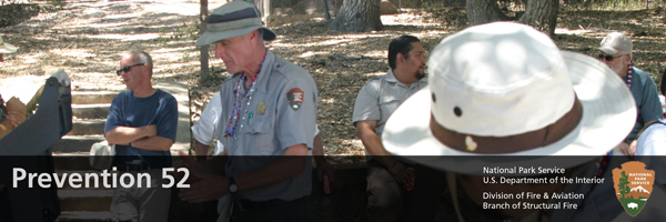 NPS Staff hosting a BBQ in uniform