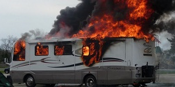 RV engulfed in flames and smoke