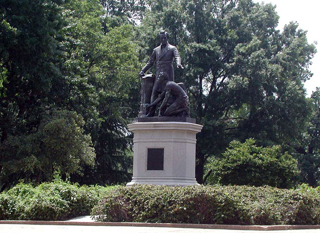 The Emancipation Monument depicts a sculpture on a pedestal of Lincoln freeing a shackled slave.