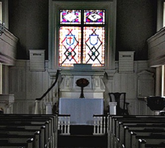 Single stained glass window inside church