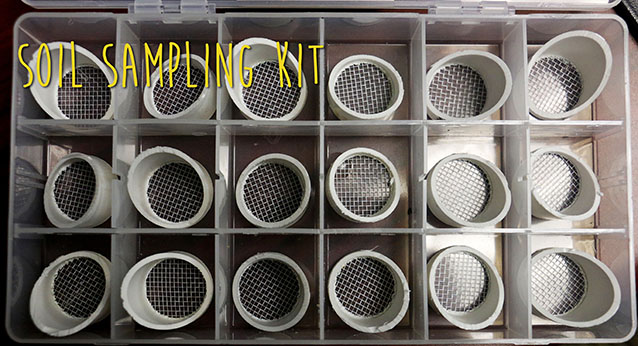 several small soil filters in a clear plastic box