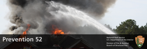 water hose shooting at a burning house water hose shooting at a burning house