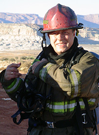 image of an NPS Firefighter looking at the camera