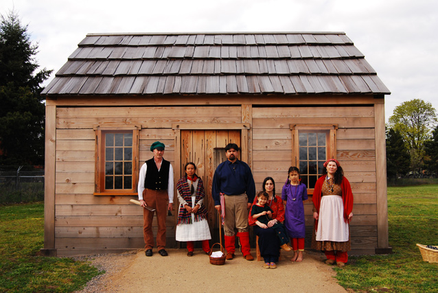 Portrait of living history reenactors at a Village house at Fort Vancouver National Historic Site