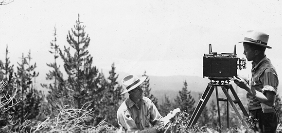 Lester Mo uses the Osborne camera to capture a panoramic photograph in the woods