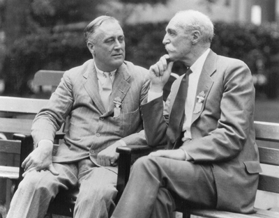 Franklin D Roosevelt sitting on a bench talking with Gifford Pinchot. Franklin D Roosevelt sitting on a bench talking with Gifford Pinchot.