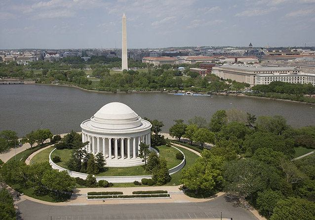 Aerial view of the round memorial surrounded the Tidal Basin and other landscape features.