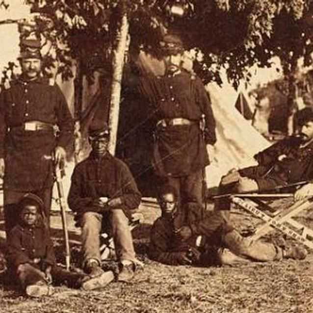 Photo of officers and African American enlisted men of the 2nd Rhode Island Camp at Camp Brightwood.
