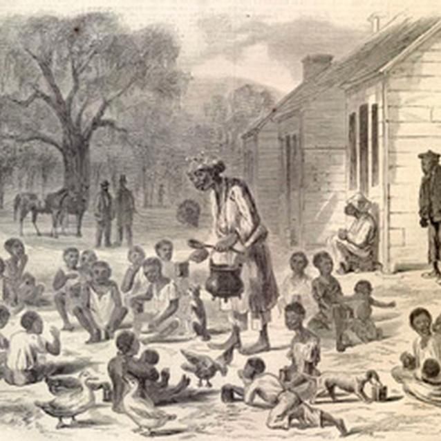 Print of freed slaves outside a school Print of freed slaves outside a school