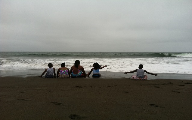 A group of Home Away program participants enjoying nearby Rodeo Beach.