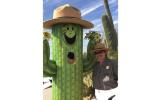 Saguaro National Park mascot Sunny the Saguaro and Regional Director Sue Masica 