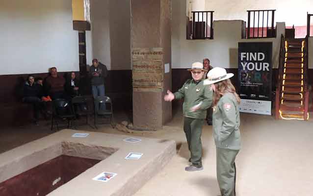 Rangers and visitors interact in the Great Kiva.