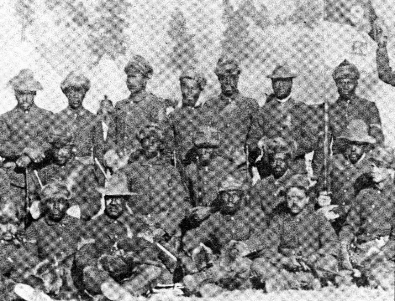 African American soldiers sitting, kneeling and standing for a casual photo