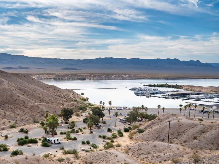 Campground with lake and marina in background.