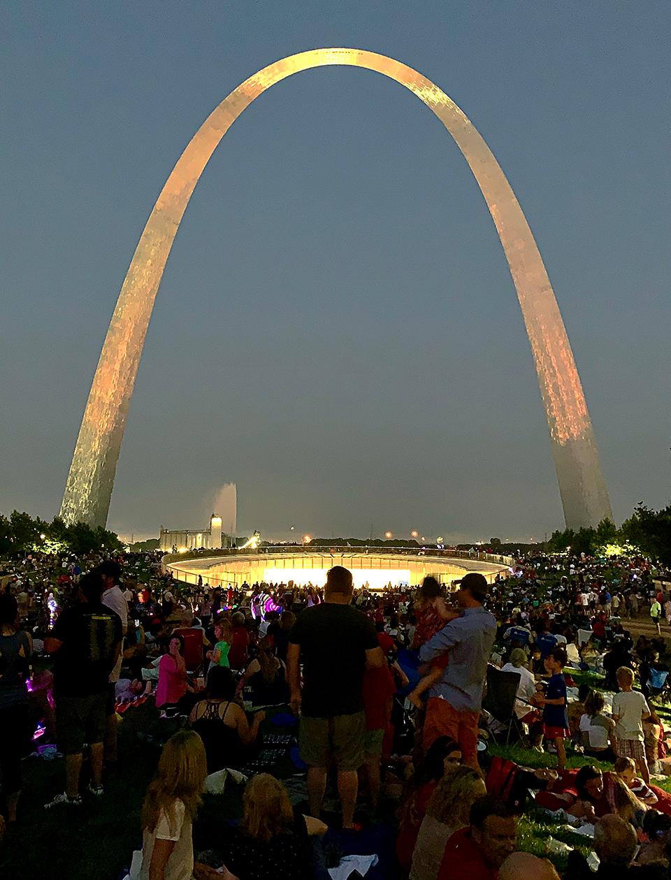 People waiting on the Arch grounds waiting for the 4th of July Fireworks show to start.