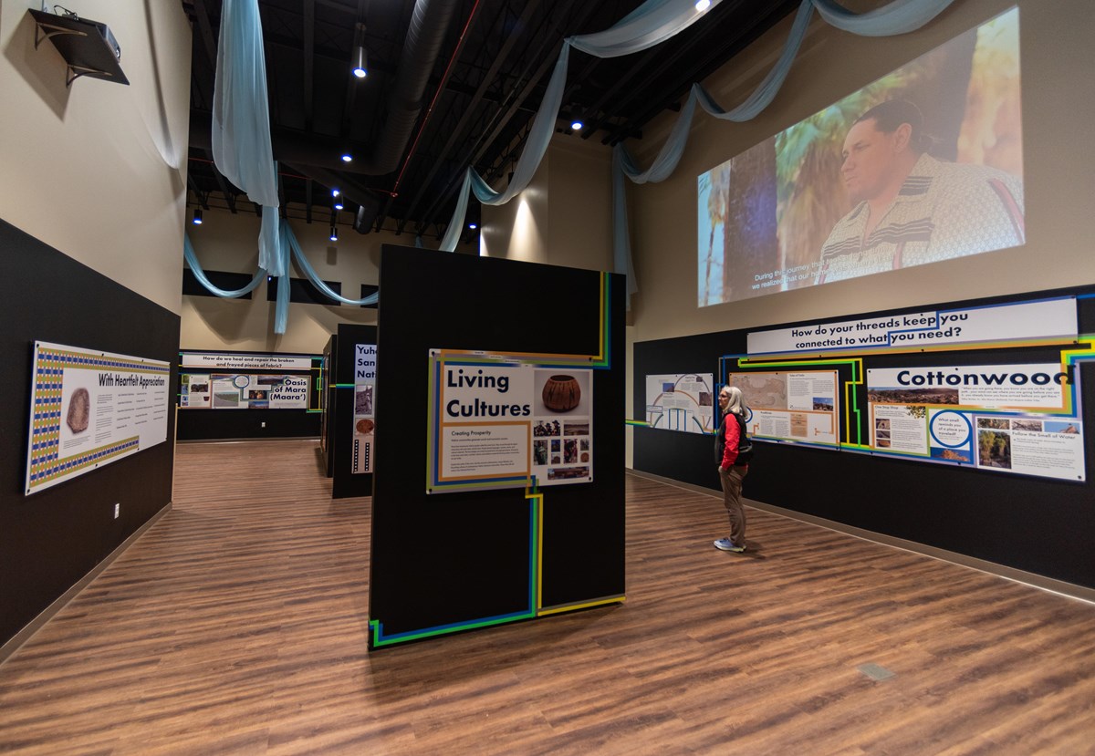 An exhibit hall featuring colorful educational exhibits.