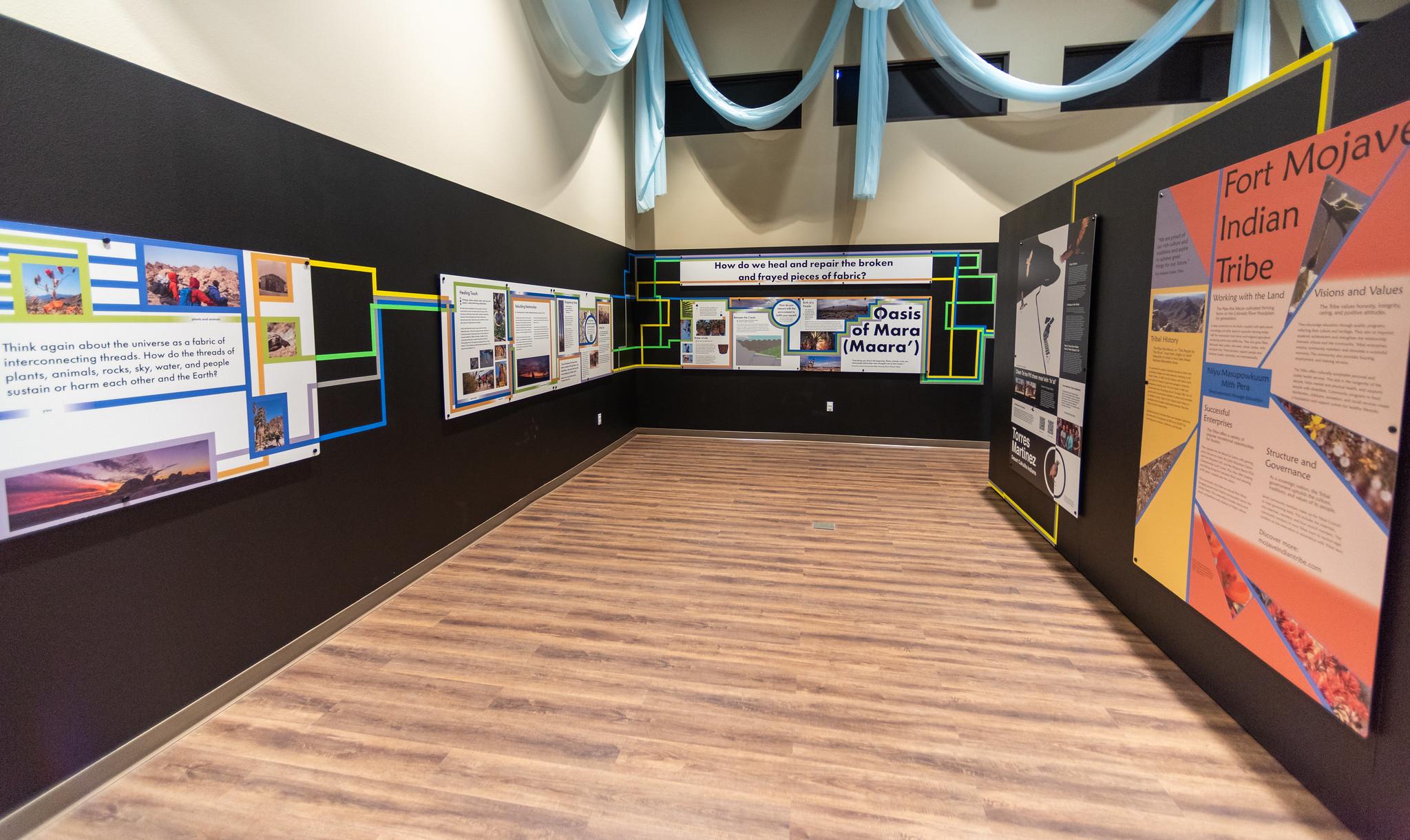 An exhibit hall featuring colorful educational exhibits.
