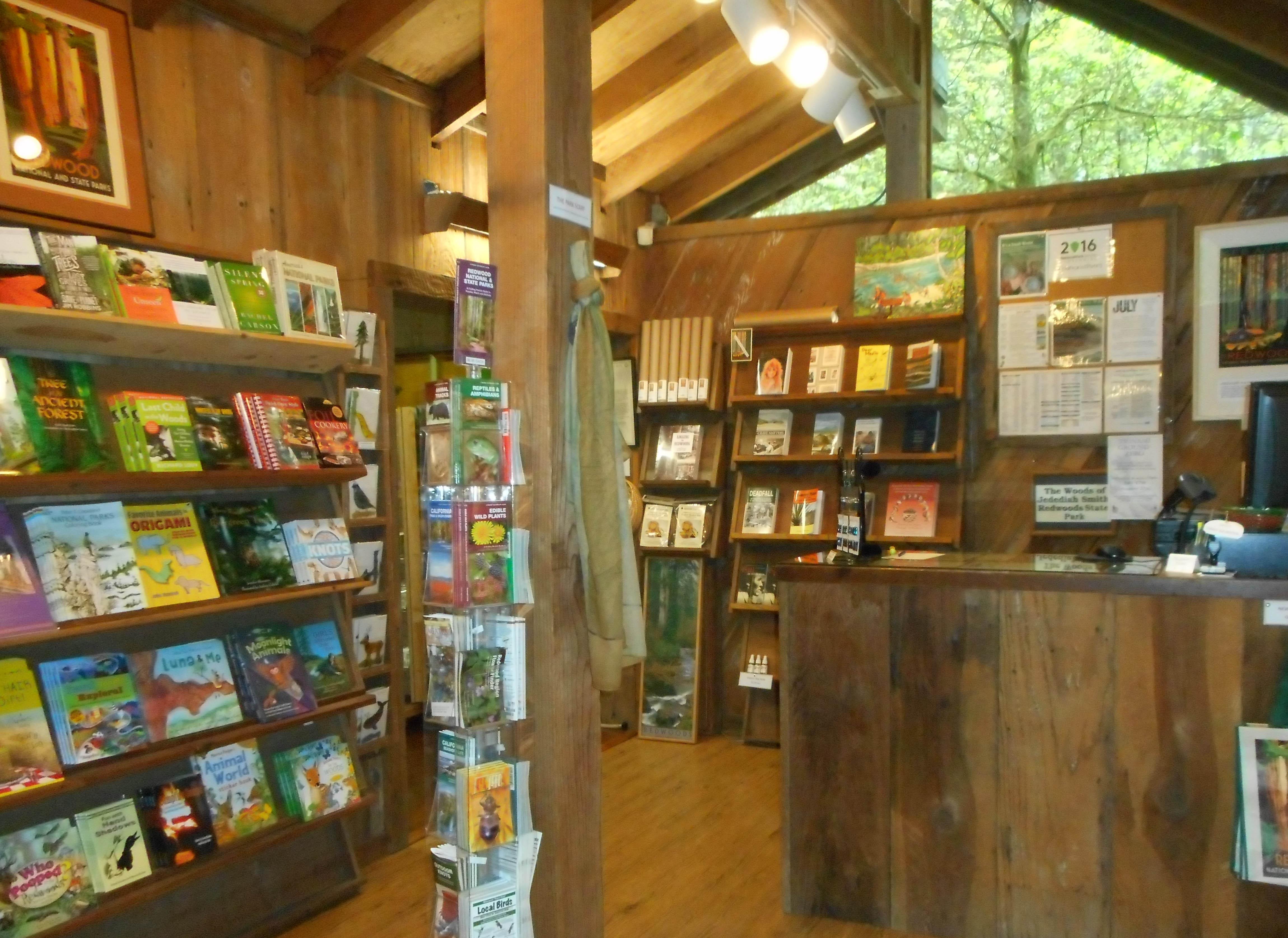 Sales area with shelves, desk and windows.