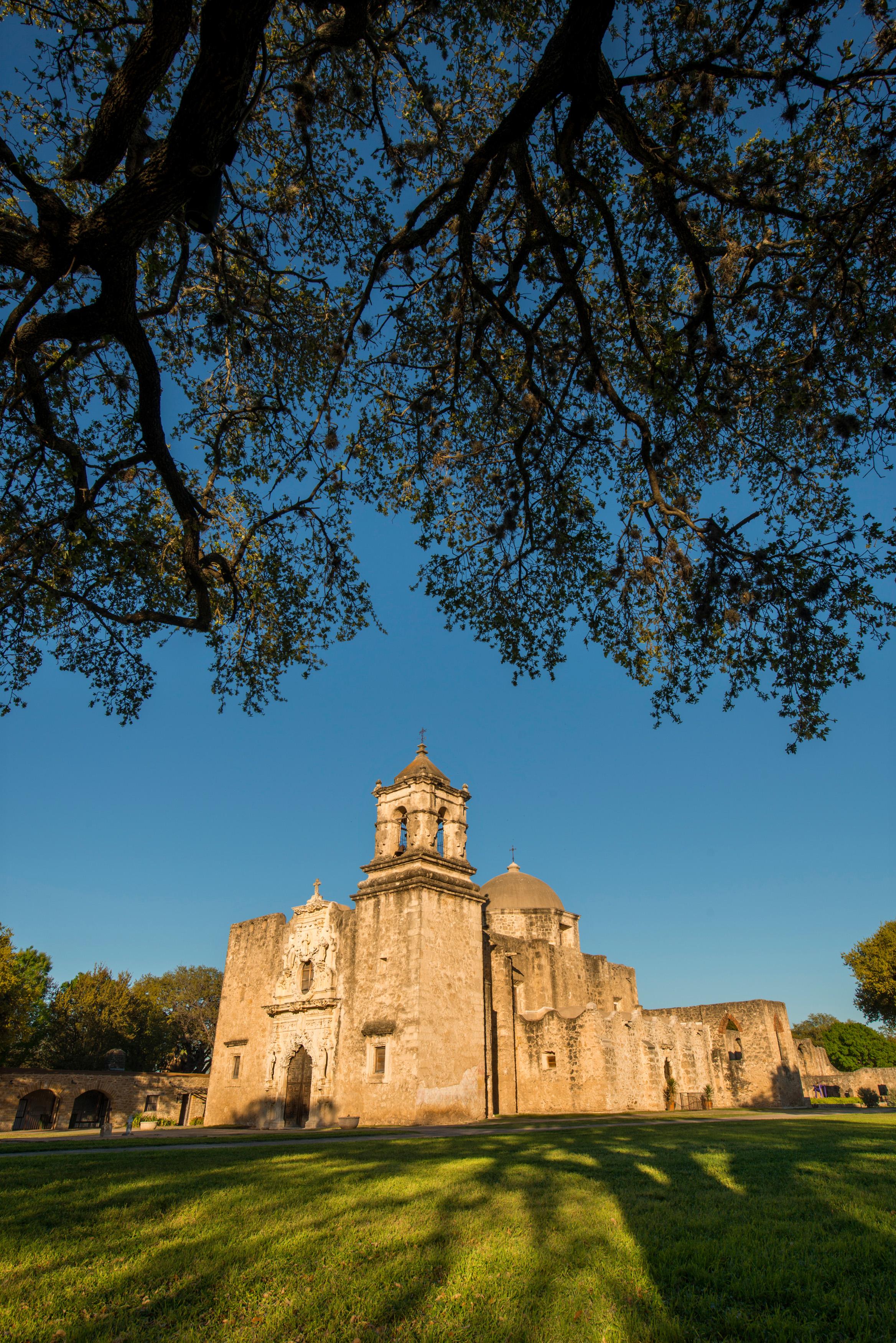 Mission San Jose church and convento during the golden hour with tree