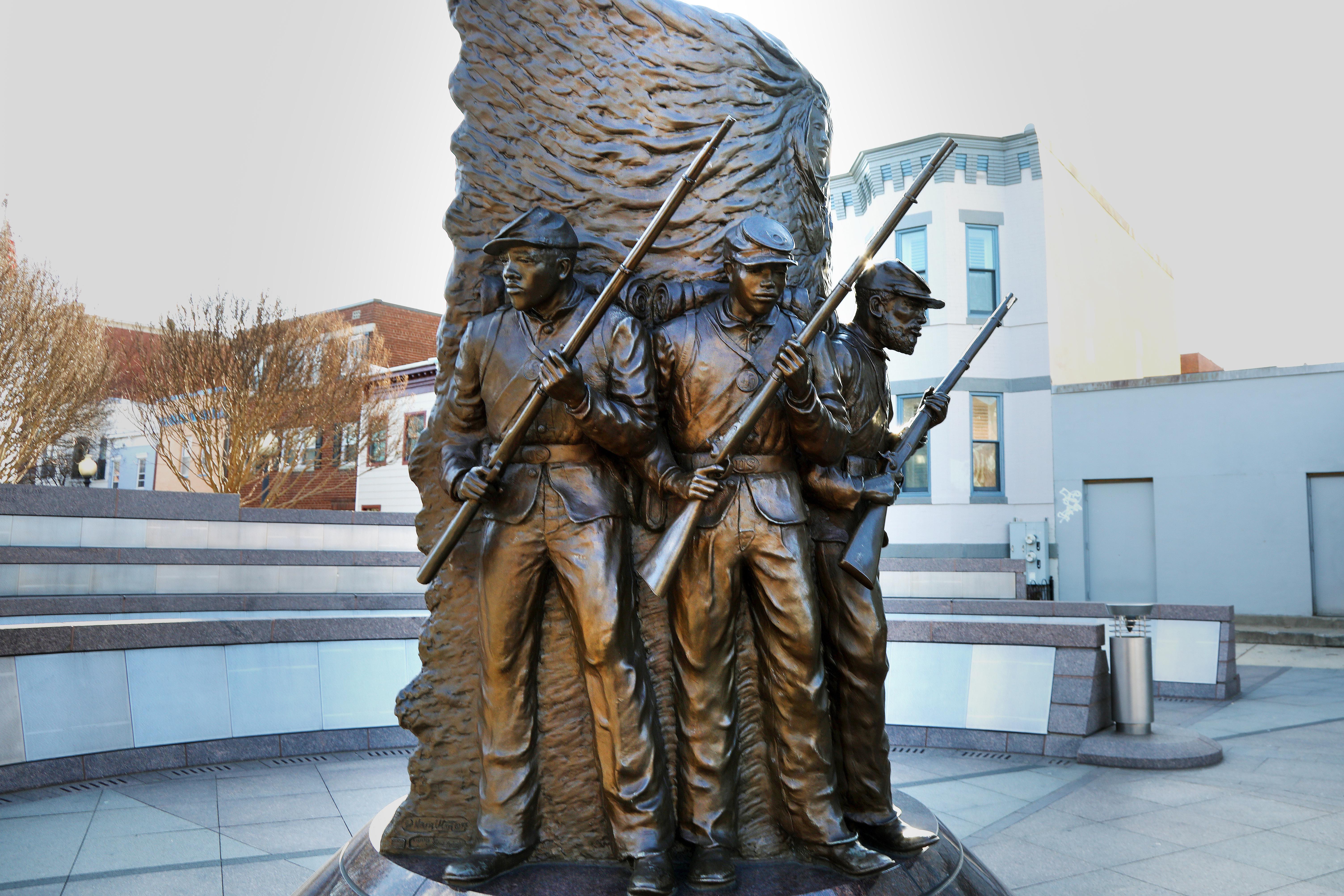 Bronze statue of African American Civil War soldiers.