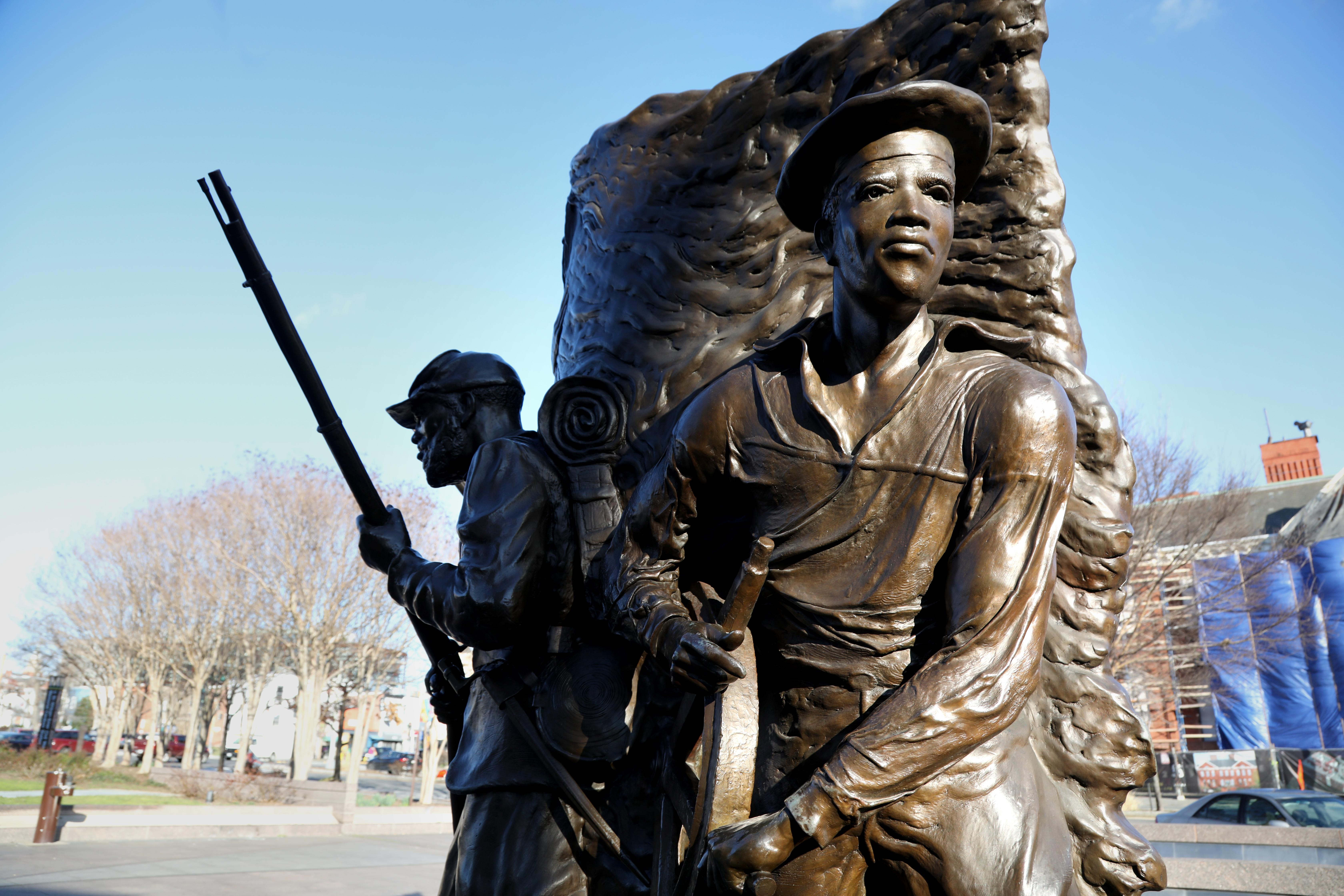 Bronze statue of African American Civil War soldier.