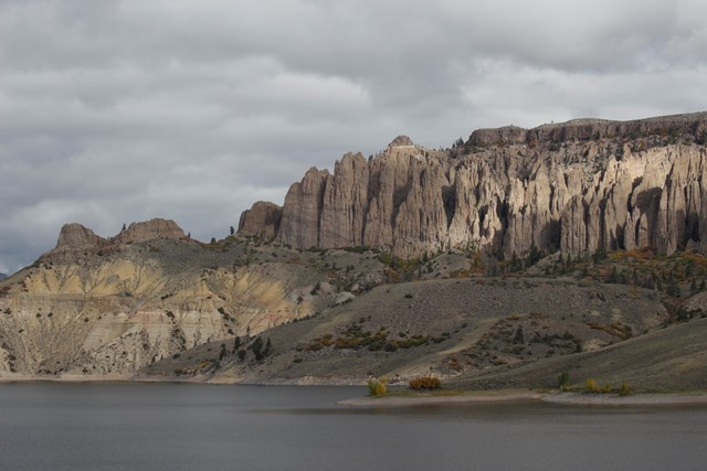 Large pinnacle spires across a body of water