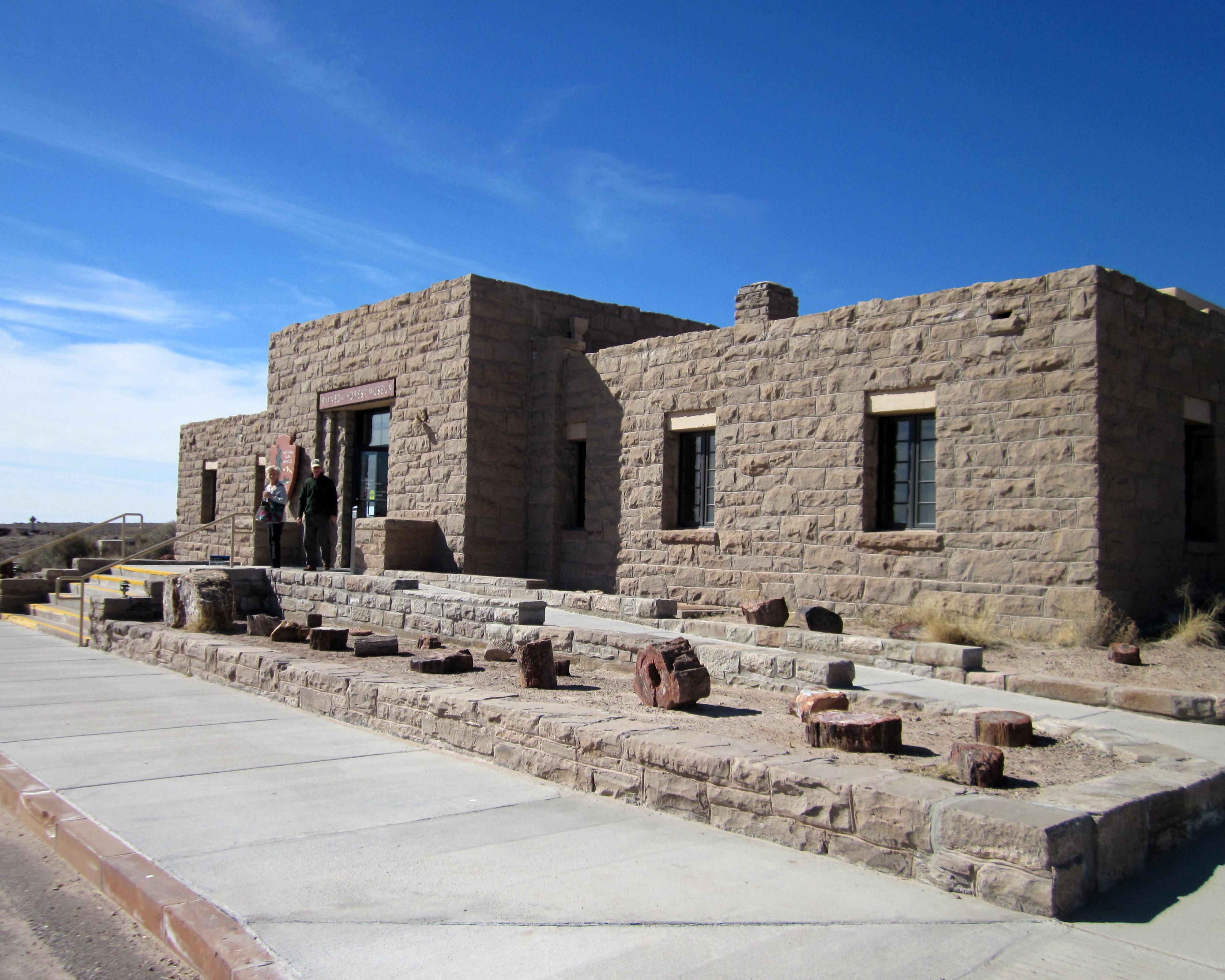 Sandstone front Exterior at Rainbow Forest Museum showing accessibility ramp, blue sky