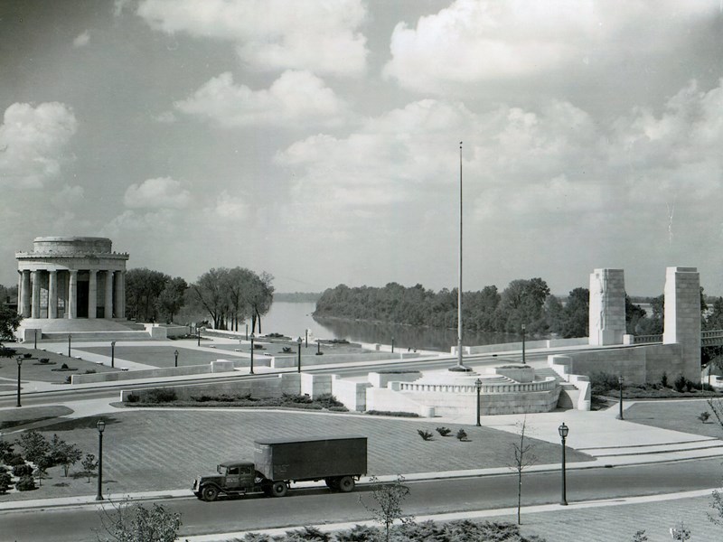 The Clark memorial and bridge approach with agriculture truck in foreground.