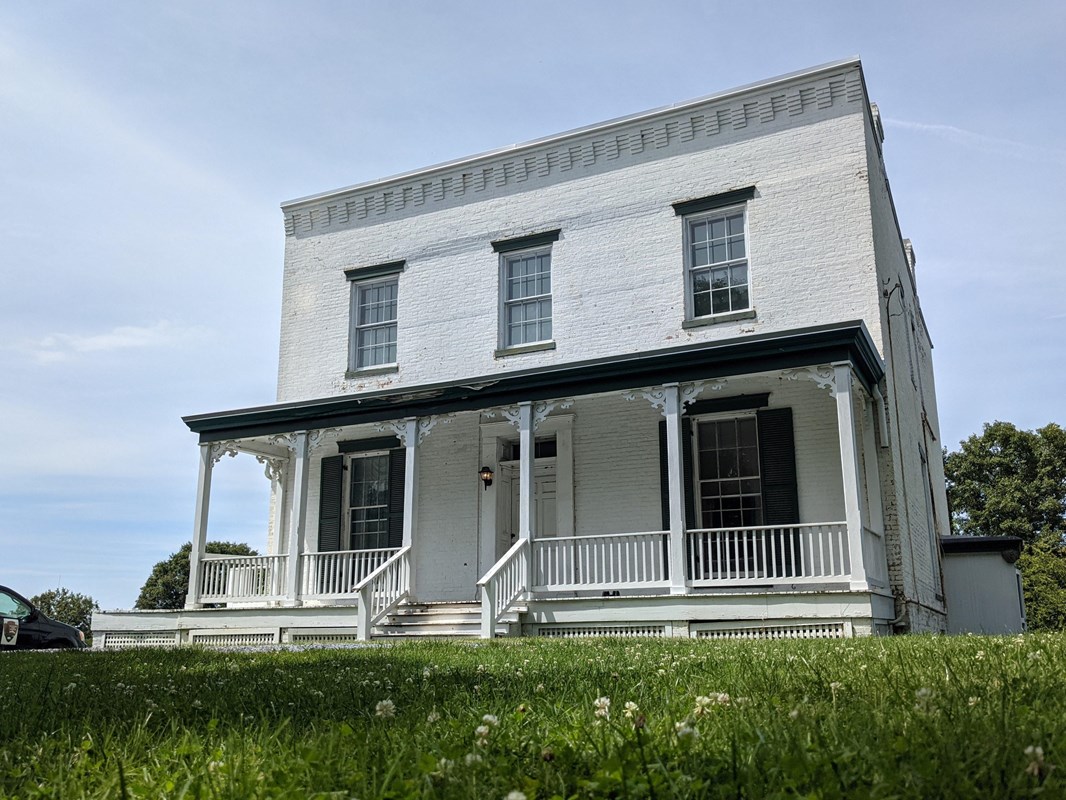 A white brick two story building 
