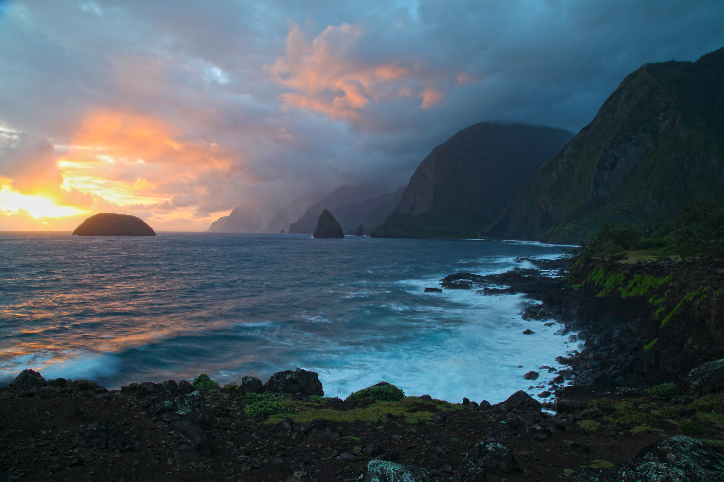 View of the sunrise over the north shore of Molokai