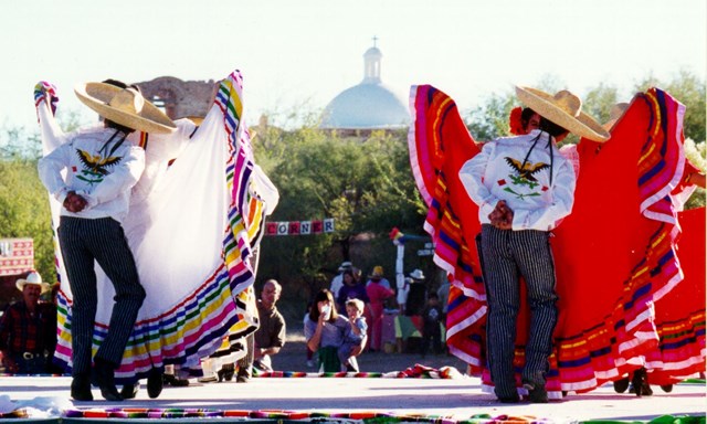 folklorico dancers in front of church