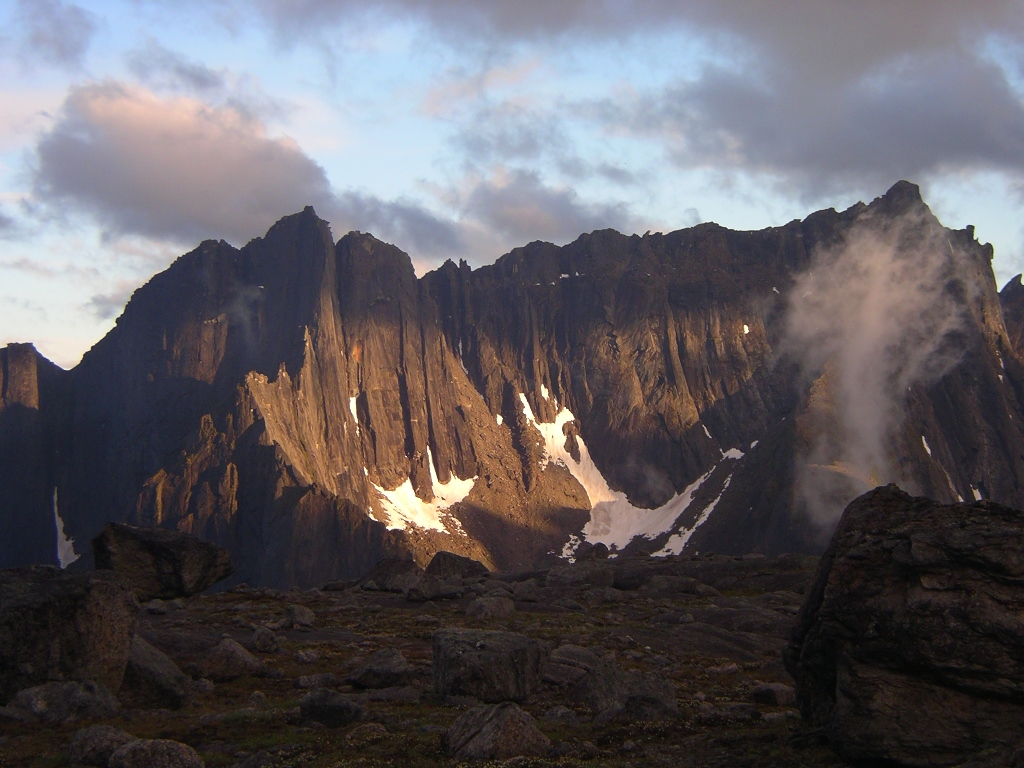 Alpenglow on the granite cliffs of mountains