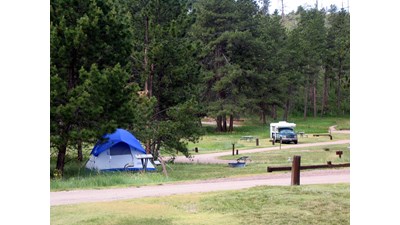 tent and camper in campground