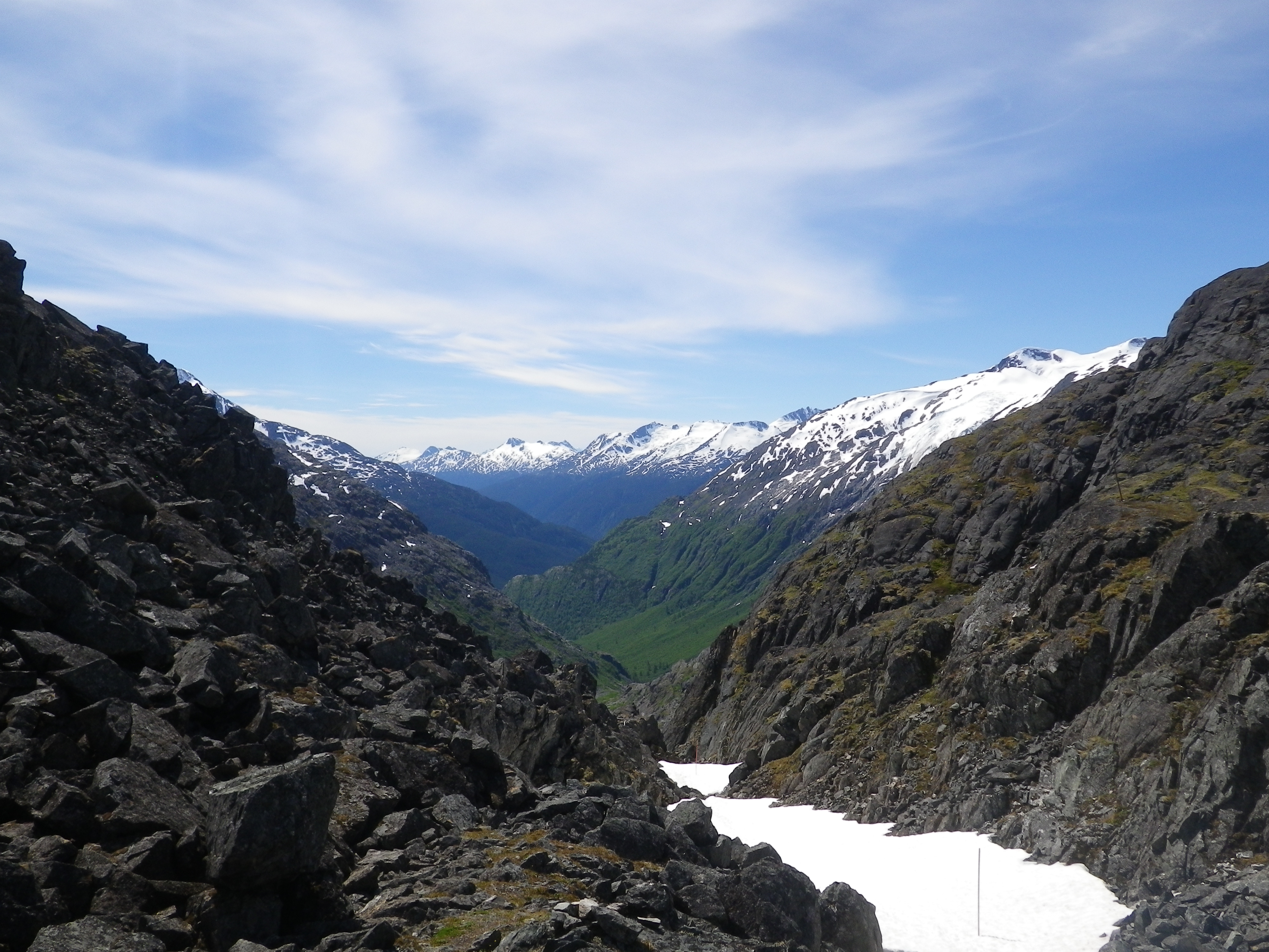 View from a mountain pass down a valley